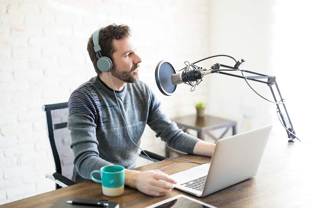 Man_Podcasting_in_Quiet_Room.jpg